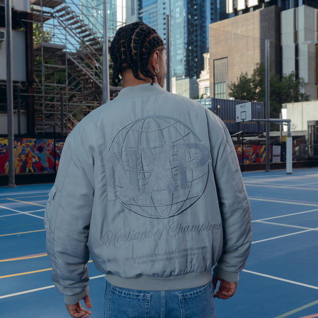 Model Wears Spare Bomber Jacket Neutral Grey Jackets in Grey - Image 3