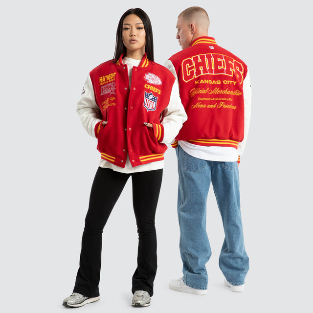 Model Wears Kansas City Chiefs Huddle Varsity Jacket Red/White Jackets in Red - Image 2