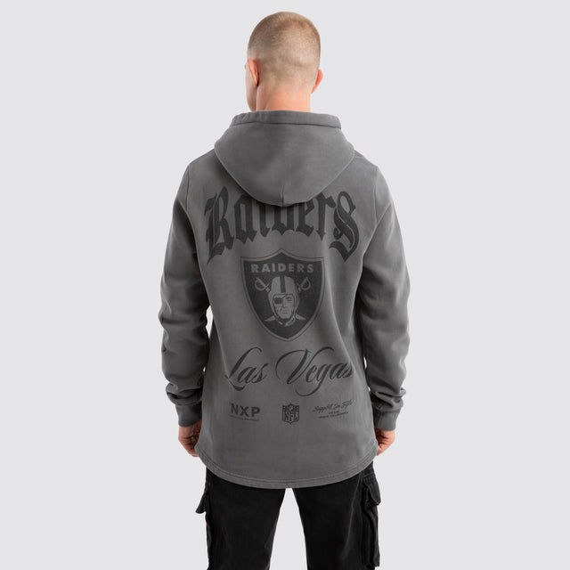 Model Wears Las Vegas Raiders Defence Dual Curved Hoodie Pigment Charcoal Hoodies in Grey - Image 1