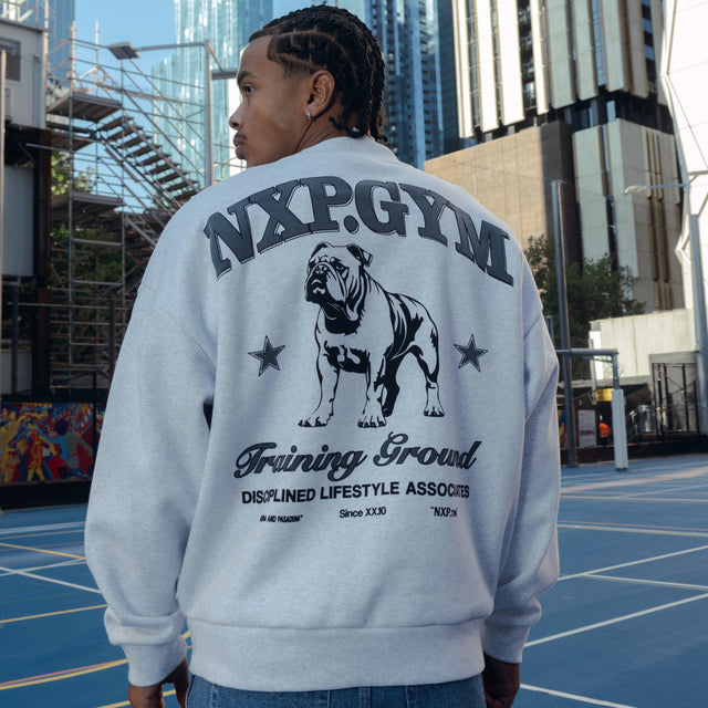 Model Wears Brawler Box Fit Sweater Snow Marle Grey Jumpers in Grey - Image 3