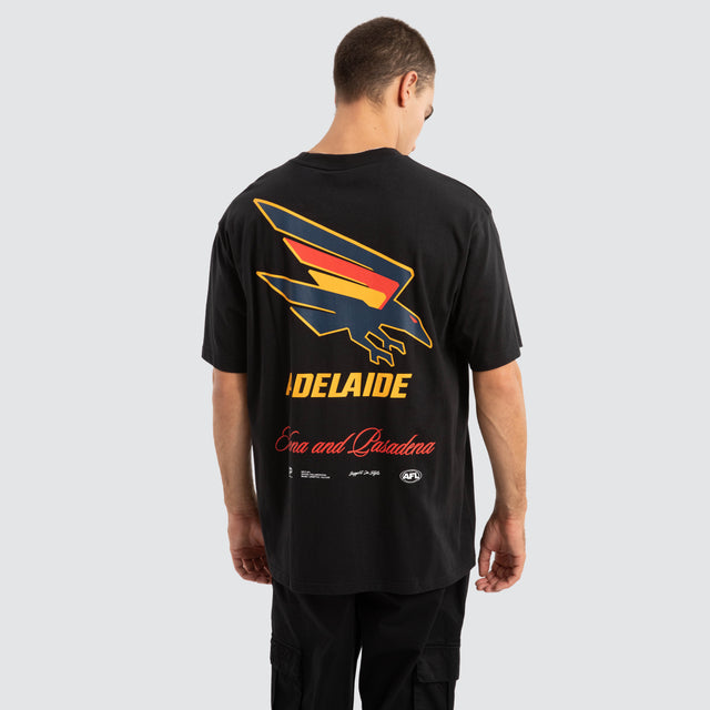 Model Wears Adelaide Crows AFL Season Tee Jet Black T-Shirts in Black - Image 1