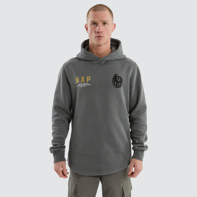 Model Wears Collingwood Magpies Grand Hoodie Pigment Charcoal Hoodies in Grey - Image 4