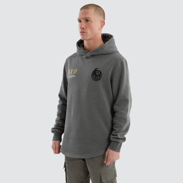 Model Wears Collingwood Magpies Grand Hoodie Pigment Charcoal Hoodies in Grey - Image 3