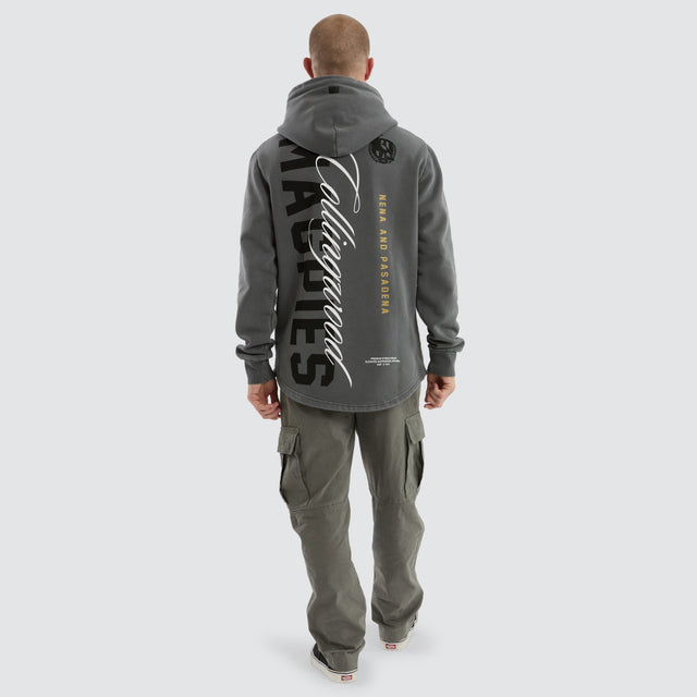 Model Wears Collingwood Magpies Grand Hoodie Pigment Charcoal Hoodies in Grey - Image 5