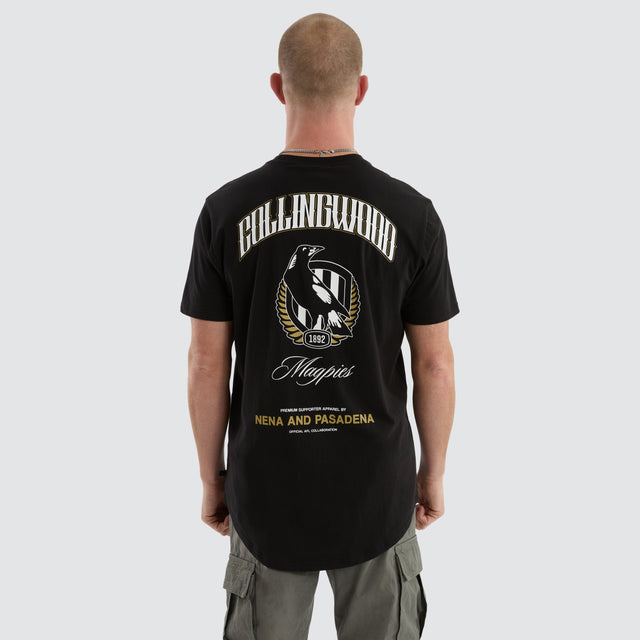 Model Wears Collingwood Magpies Legend Tee Jet Black T-Shirts in Black - Image 1