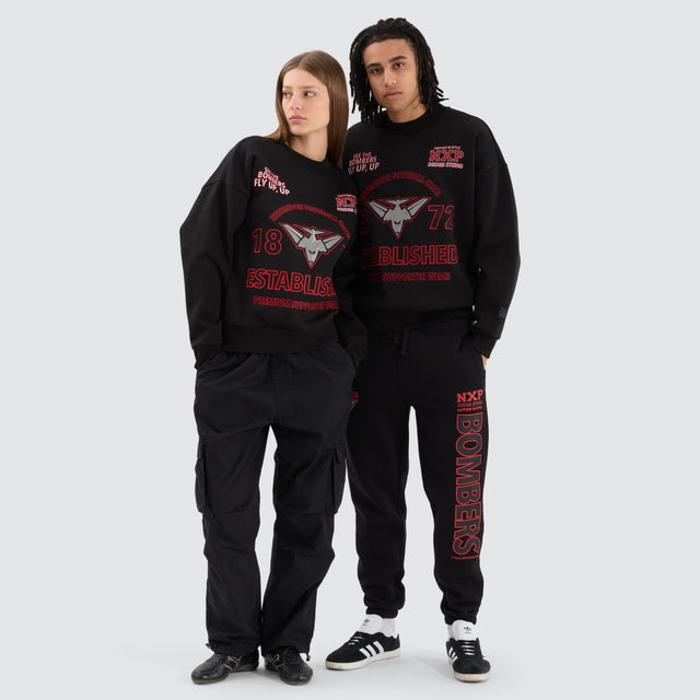 Model Wears Essendon Bombers AFL Box Fit Sweater Jet Black Jumpers in Black - Image 7