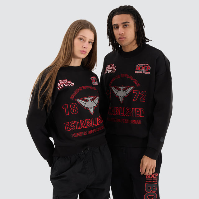 Model Wears Essendon Bombers AFL Box Fit Sweater Jet Black Jumpers in Black - Image 4