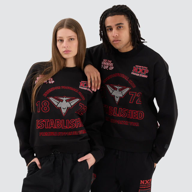 Model Wears Essendon Bombers AFL Box Fit Sweater Jet Black Jumpers in Black - Image 2
