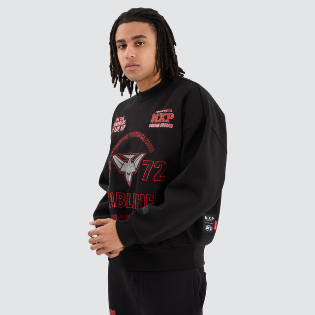 Model Wears Essendon Bombers AFL Box Fit Sweater Jet Black Jumpers in Black - Image 6