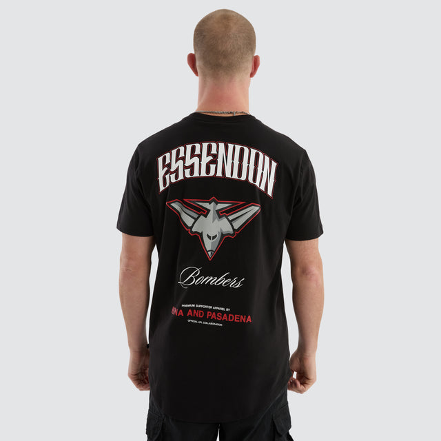 Model Wears Essendon Bombers Legend Tee Jet Black T-Shirts in Black - Image 1