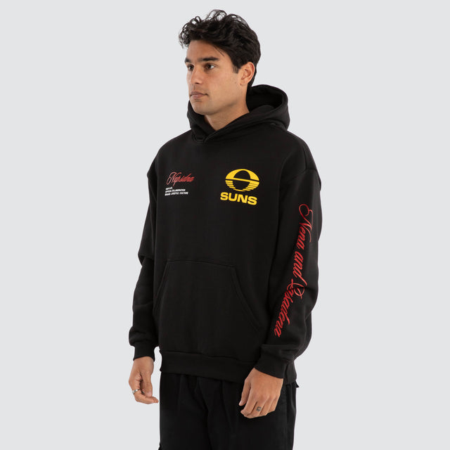Model Wears Gold Coast Suns AFL Season Hoodie Jet Black Hoodies in Black - Image 4