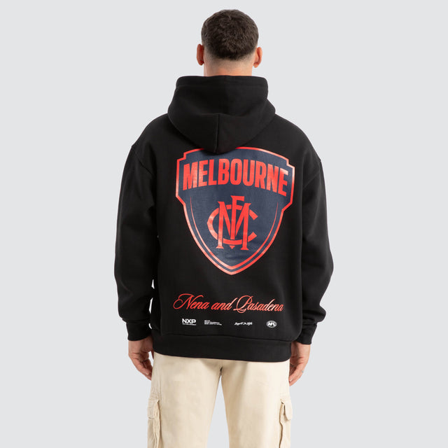 Model Wears Melbourne Demons AFL Season Hoodie Jet Black Hoodies in Black - Image 1