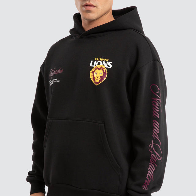 Model Wears Brisbane Lions AFL Season Hoodie Jet Black Hoodies in Black - Image 3