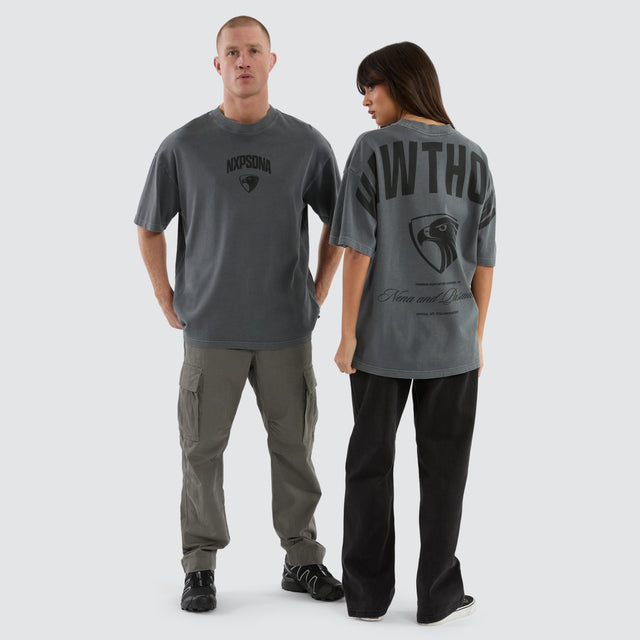 Model Wears Hawthorn Hawks Hunter Tee Pigment Charcoal T-Shirts in Grey - Image 3