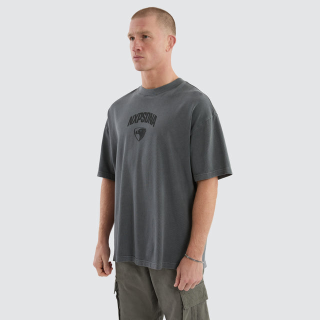 Model Wears Hawthorn Hawks Hunter Tee Pigment Charcoal T-Shirts in Grey - Image 6