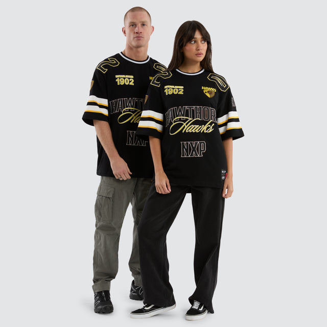 Model Wears Hawthorn Hawks League Loopback Tee Jet Black T-Shirts in Black - Image 3