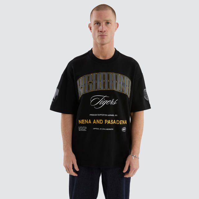 Model Wears Richmond Tigers Game-On Loopback Tee Jet Black T-Shirts in Black - Image 1