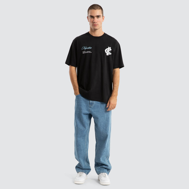 Model Wears Carlton Blues AFL Season Tee Jet Black T-Shirts in Black - Image 2