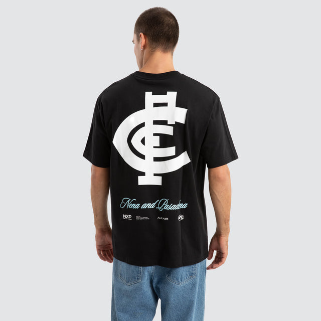 Model Wears Carlton Blues AFL Season Tee Jet Black T-Shirts in Black - Image 1