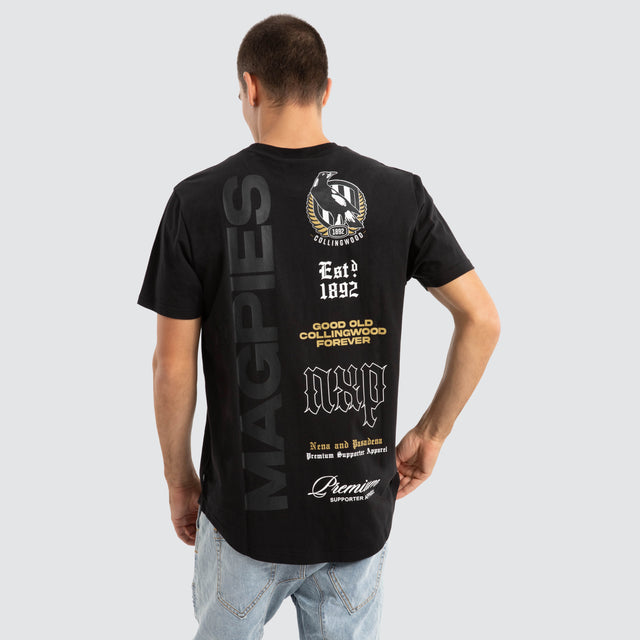 Model Wears Collingwood Magpies AFL Vert Tee Jet Black T-Shirts in Black - Image 1