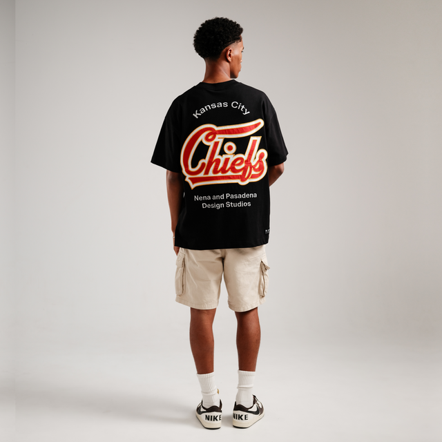 Model Wears Kansas City Chiefs NFL Raptor Tee Jet Black T-Shirts in Black - Image 2
