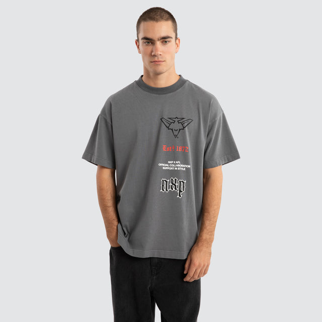 Model Wears Essendon Bombers AFL Stack Tee Pigment Charcoal T-Shirts in Grey - Image 2