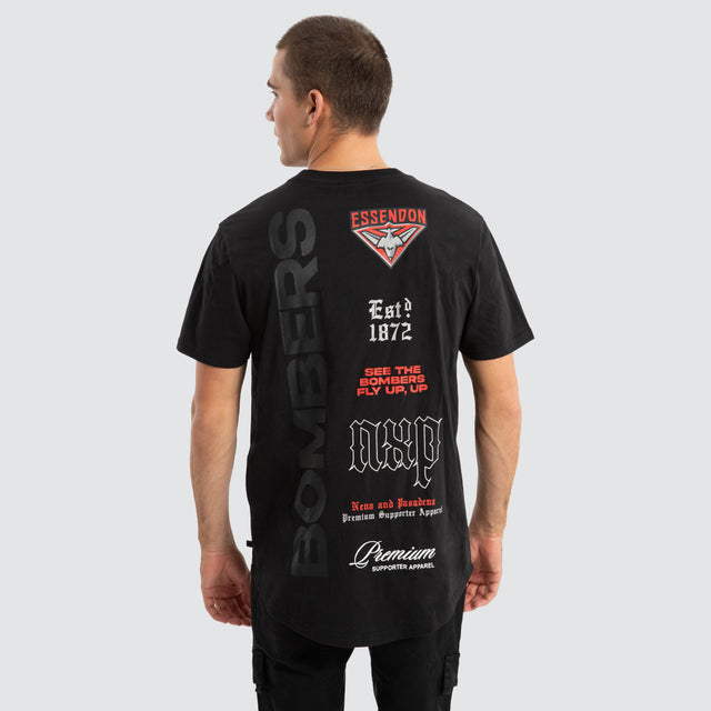 Model Wears Essendon Bombers AFL Vert Tee Jet Black T-Shirts in Black - Image 1