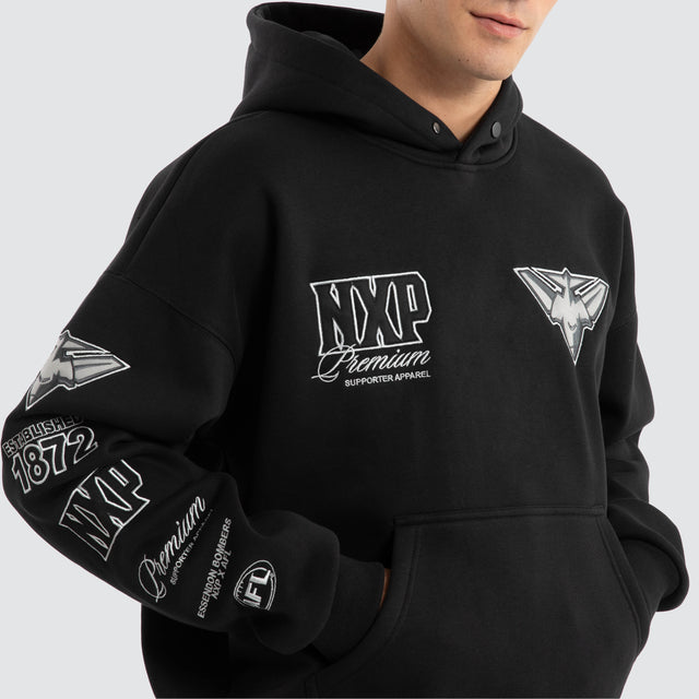 Model Wears Essendon Bombers AFL Mono Hoodie Jet Black Hoodies in Black - Image 5