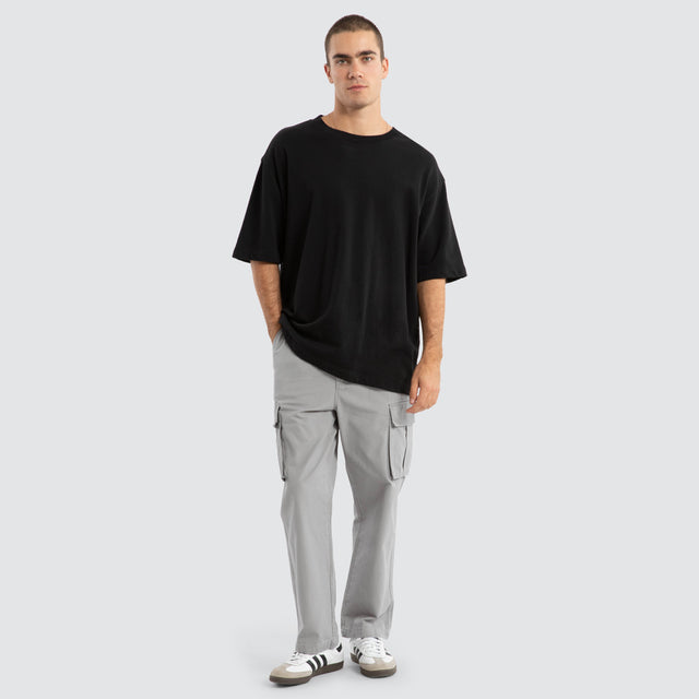 Model Wears Estevan Oversized Loopback Tee Jet Black T-Shirts in Black - Image 2
