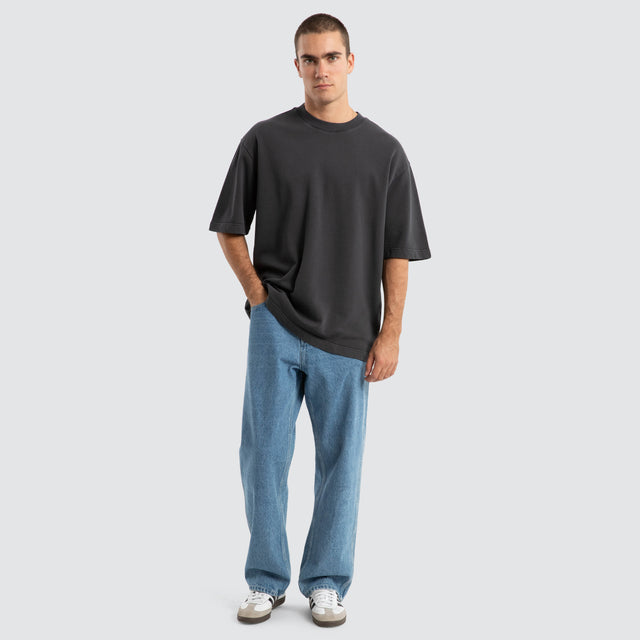 Model Wears Estevan Oversized Loopback Tee Pigment Asphalt T-Shirts in Grey - Image 4
