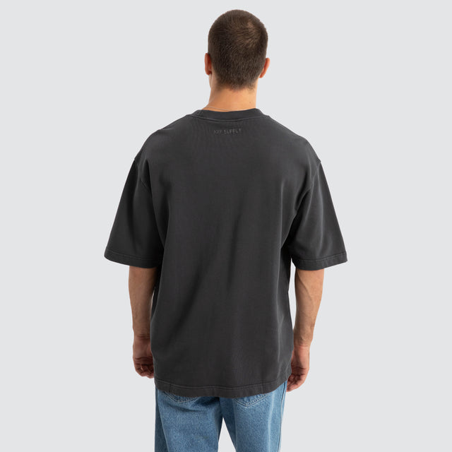 Model Wears Estevan Oversized Loopback Tee Pigment Asphalt T-Shirts in Grey - Image 5