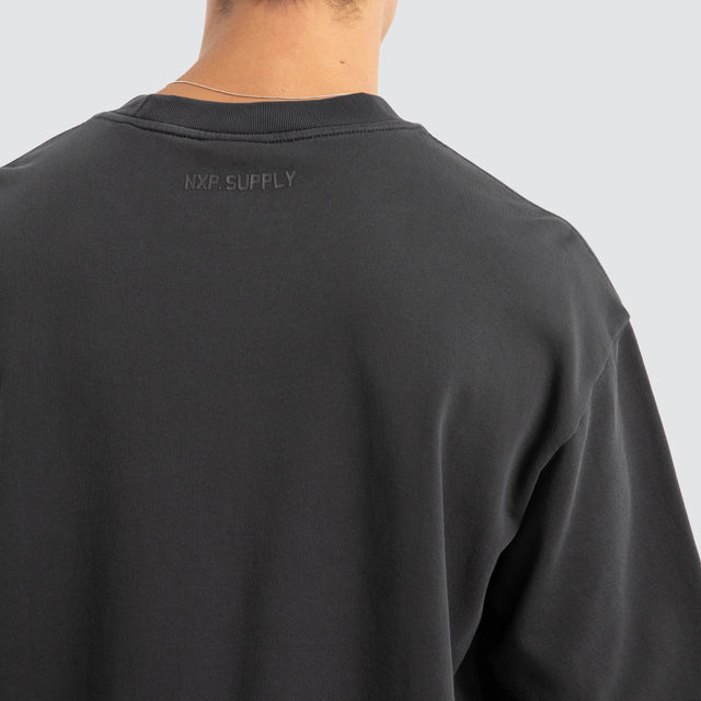 Model Wears Estevan Oversized Loopback Tee Pigment Asphalt T-Shirts in Grey - Image 3