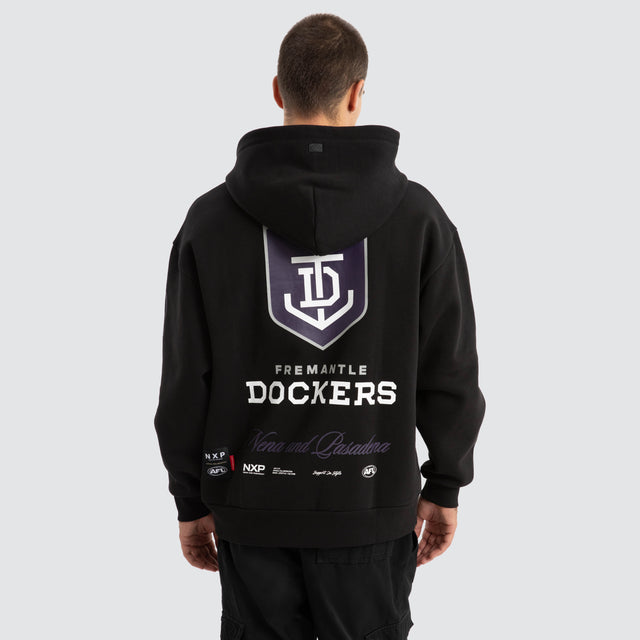 Model Wears Fremantle Dockers AFL Season Hoodie Jet Black Hoodies in Black - Image 1