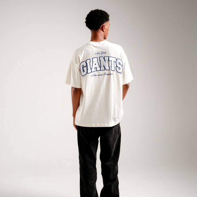 Model Wears New York Giants NFL Raptor Tee Tofu T-Shirts in Off-White - Image 2
