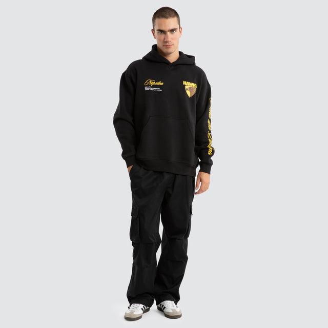 Model Wears Hawthorn Hawks AFL Season Hoodie Jet Black Hoodies in Black - Image 3