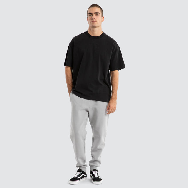 Model Wears Melville Raptor Tee Jet Black T-Shirts in Black - Image 2