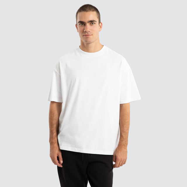 Model Wears Melville Raptor Tee Optical White T-Shirts in White - Image 1