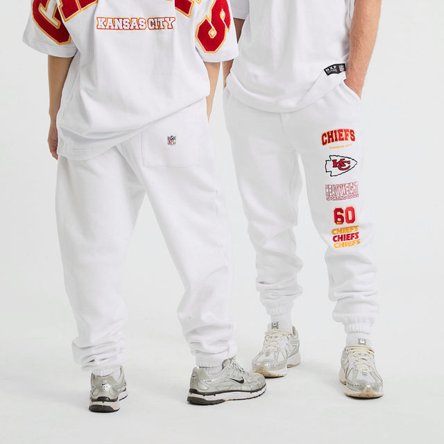 Model Wears Kansas City Chiefs Kickoff Trackpant White Trackpants in White - Image 1