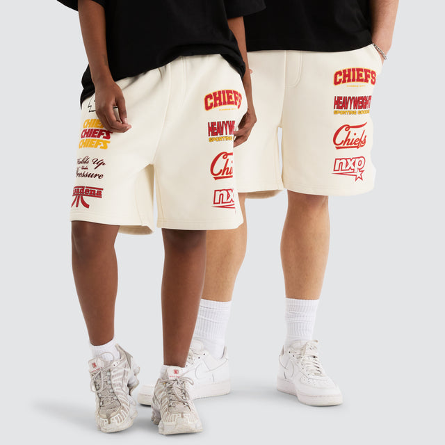 Model Wears Kansas City Chiefs NFL Shorts Tofu Shorts in Off-White - Image 5