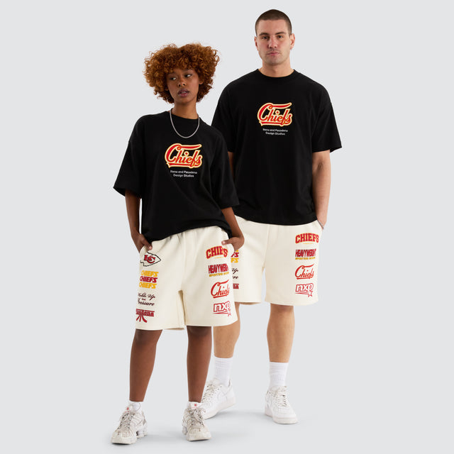 Model Wears Kansas City Chiefs NFL Shorts Tofu Shorts in Off-White - Image 3