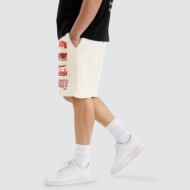 Model Wears Kansas City Chiefs NFL Shorts Tofu Shorts in Off-White - Image 10