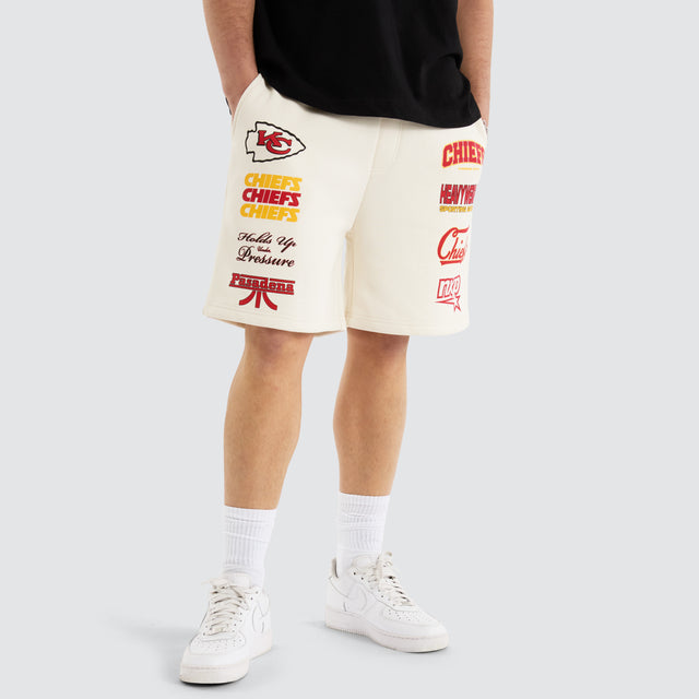 Model Wears Kansas City Chiefs NFL Shorts Tofu Shorts in Off-White - Image 1