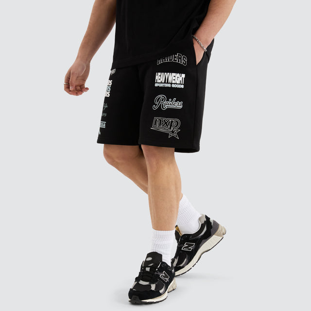 Model Wears Las Vegas Shorts  Jet Black Shorts in Black - Image 1