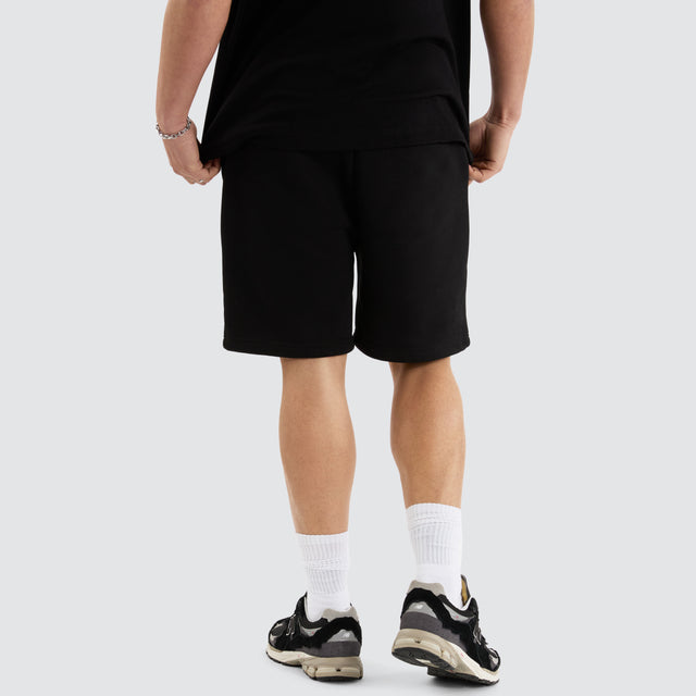 Model Wears Las Vegas Shorts  Jet Black Shorts in Black - Image 5
