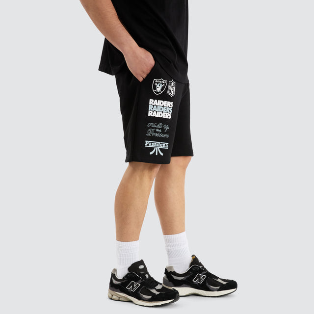 Model Wears Las Vegas Shorts  Jet Black Shorts in Black - Image 4