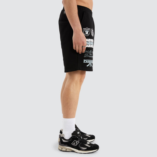 Model Wears Las Vegas Shorts  Jet Black Shorts in Black - Image 8