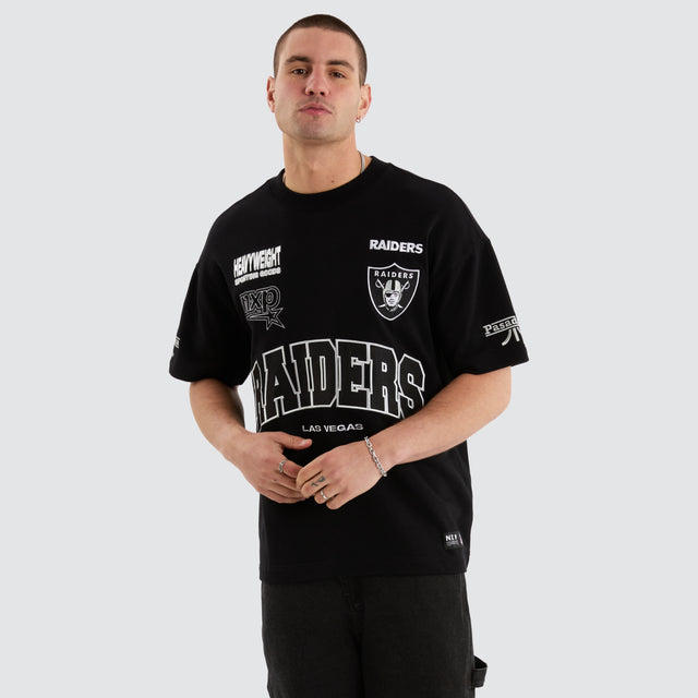Model Wears Las Vegas Raiders NFL Loopback Raptor Tee Jet Black T-Shirts in Black - Image 9