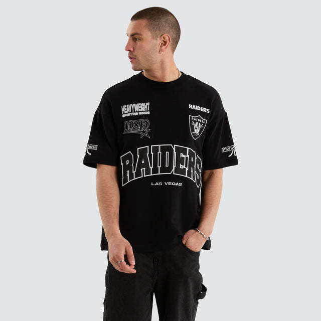 Model Wears Las Vegas Raiders NFL Loopback Raptor Tee Jet Black T-Shirts in Black - Image 1