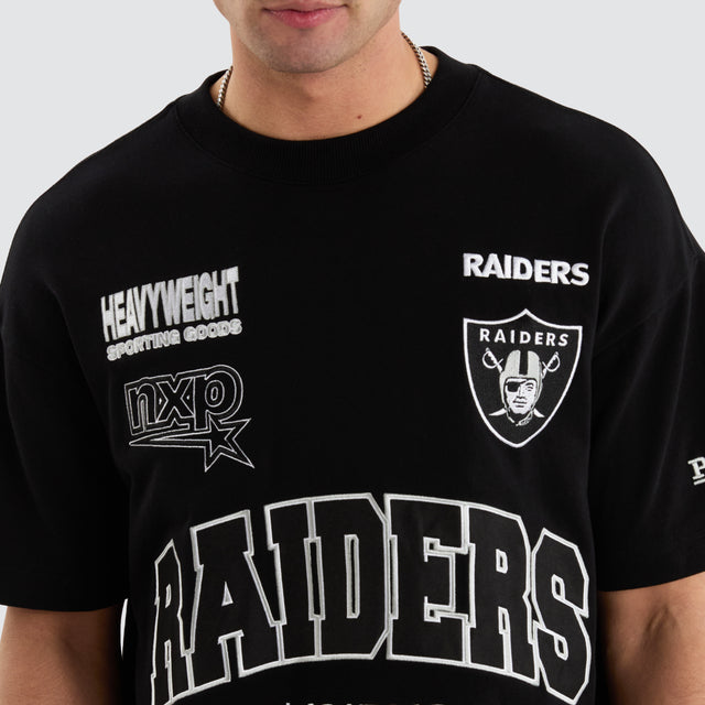 Model Wears Las Vegas Raiders NFL Loopback Raptor Tee Jet Black T-Shirts in Black - Image 3