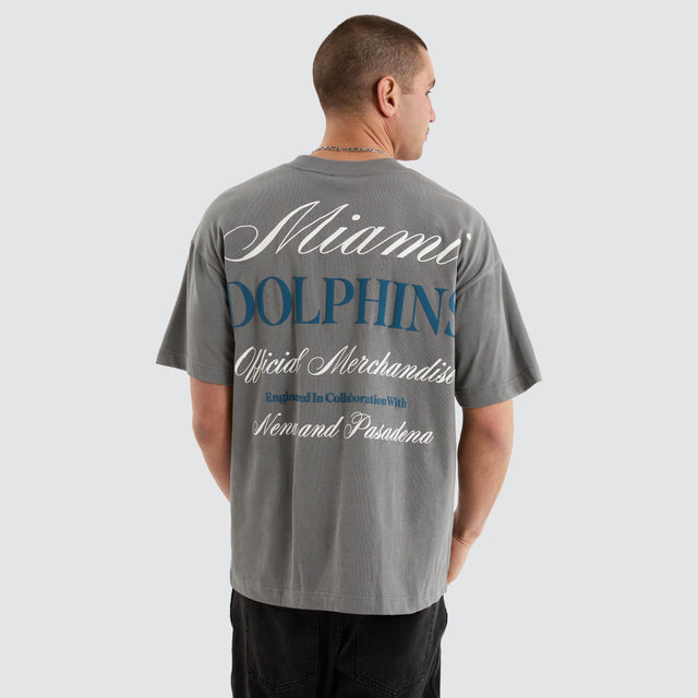 Model Wears Miami Dolphins NFL Raptor Tee Smoke T-Shirts in Grey - Image 1